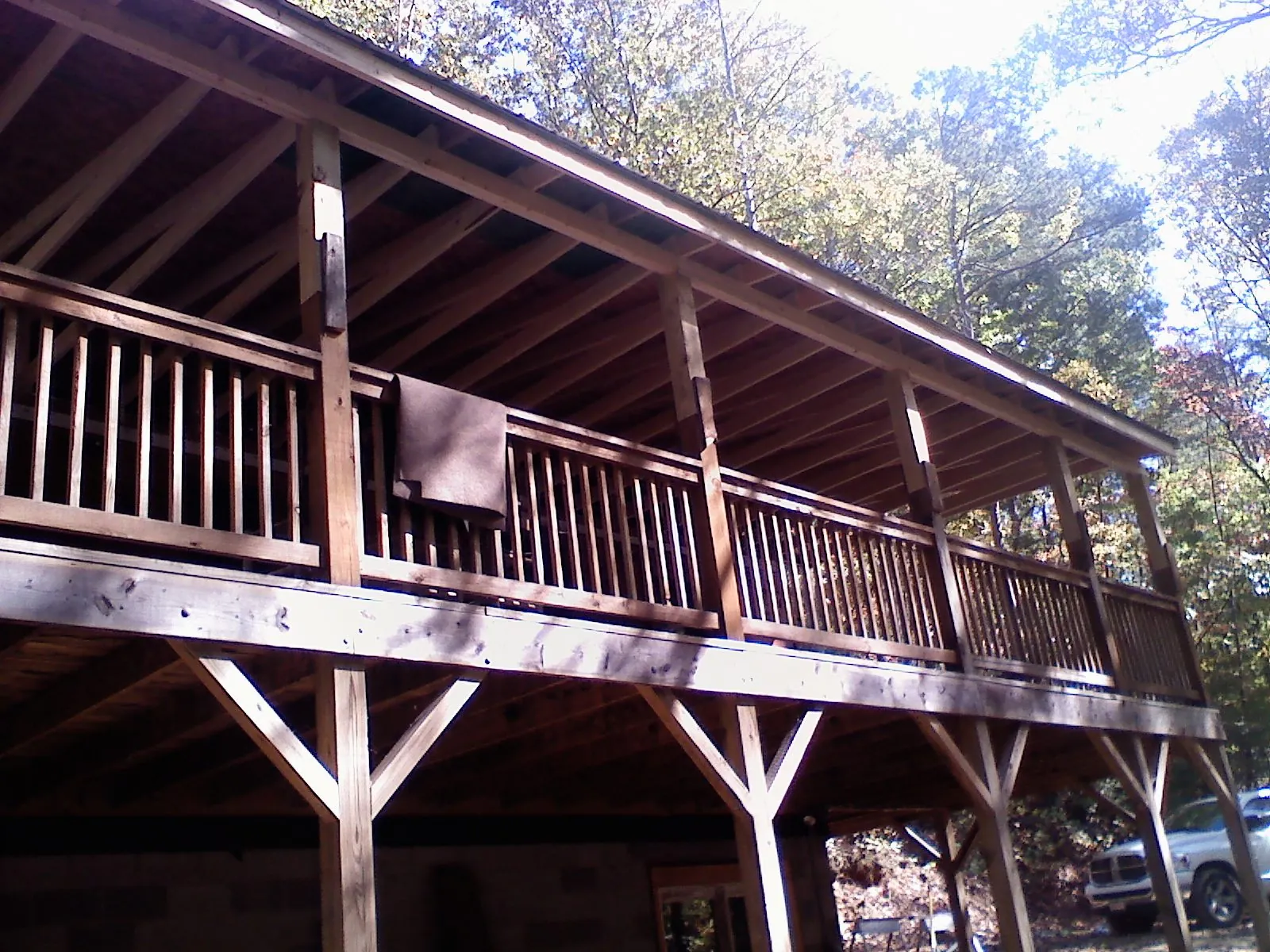 Timber framing under a new elevated porch and deck — Roof Leak Repair in Mead by Roofing Brothers